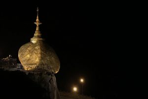 The golden rock of Mount Kyaiktiyo by night